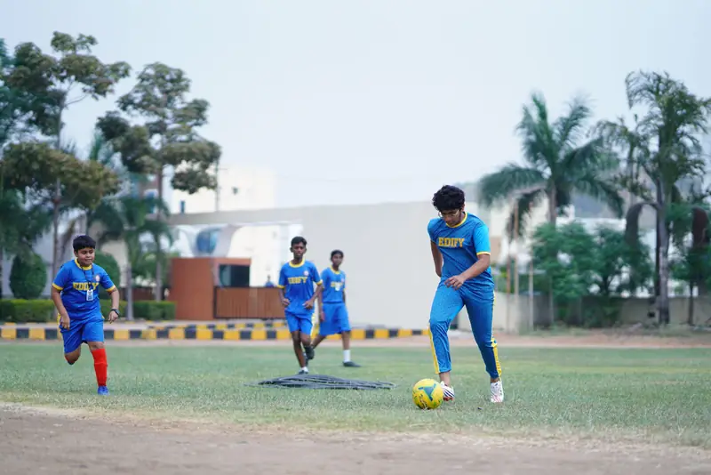 Students playing football